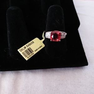 Orange CZ and White CZ ring.